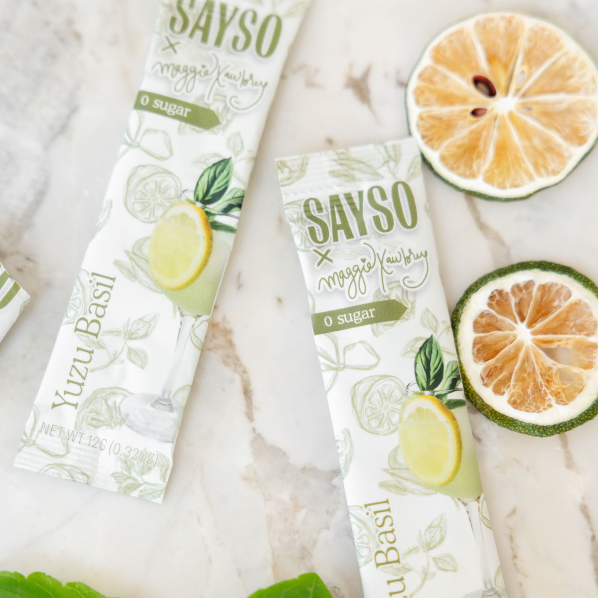 SAYSO x Maggie Awbrey Yuzu Basil drink mixes on a counter