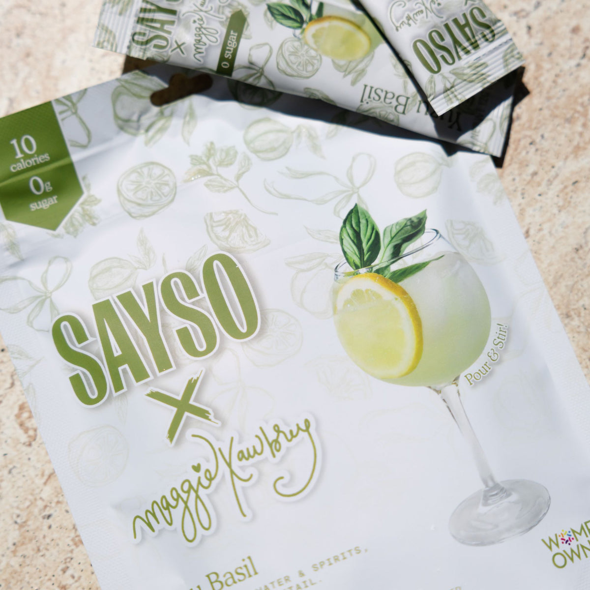 SAYSO x Maggie Awbrey Yuzu Basil drink mixes on a counter
