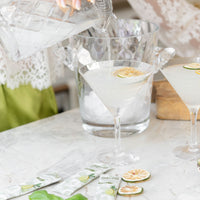 SAYSO x Maggie Awbrey Yuzu Basil drink mixes being poured into a glass