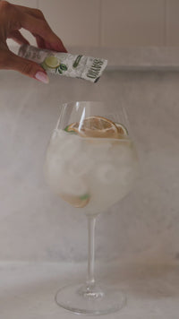 Video of pouring the SAYSO x Maggie Awbrey Yuzu Basil packet into a drink